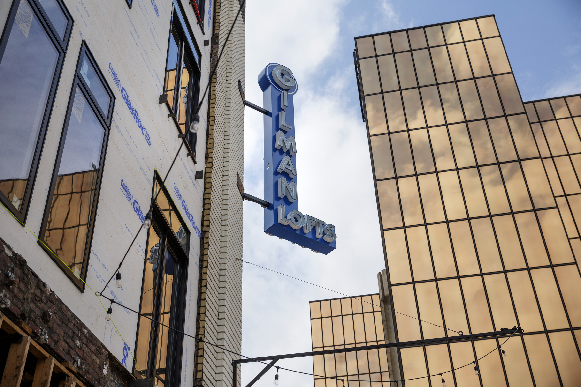 Staff photo by Doug Strickland / The former headquarters of Gilman Paint Co. is undergoing redevelopment in the West Village across Pine Street from the Westin hotel.