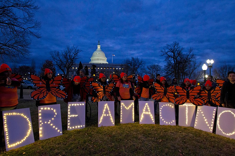 In this Jan. 21, 2018, file photo, demonstrators rally in support of Deferred Action for Childhood Arrivals (DACA) outside the Capitol Washington. A federal judge has ruled against the Trump administration's decision to end a program protecting some young immigrants from deportation. U.S. District Judge John D. Bates says the Department of Homeland Security's decision to rescind the DACA program "was unlawful and must be set aside." (AP Photo/Jose Luis Magana, File)