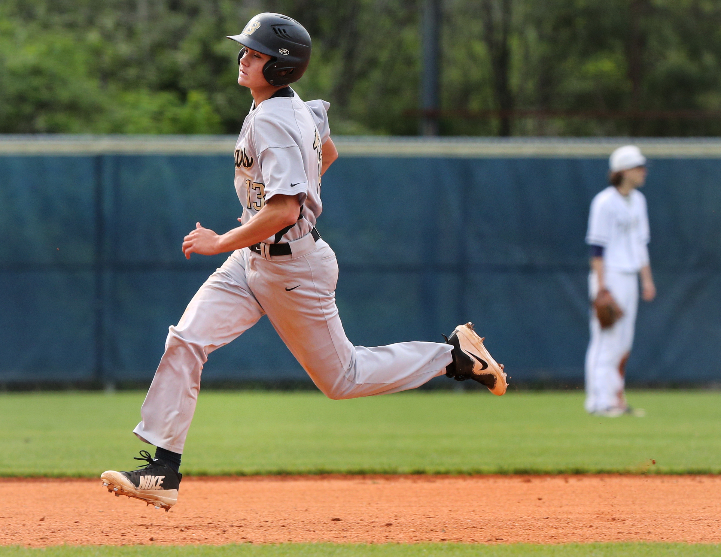 Bradley Central's Freddy Johnson (13) runs to third base during the first Soddy-Daisy vs. Bradley Central baseball game at Soddy-Daisy High School Wednesday, April 25, 2018 in Soddy-Daisy, Tenn.