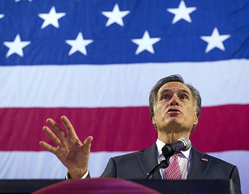 U. S. Senate candidate Mitt Romney delivers his speech to the delegates at the Utah Republican Nominating Convention Saturday last Saturday at the Maverik Center in West Valley City, Utah.