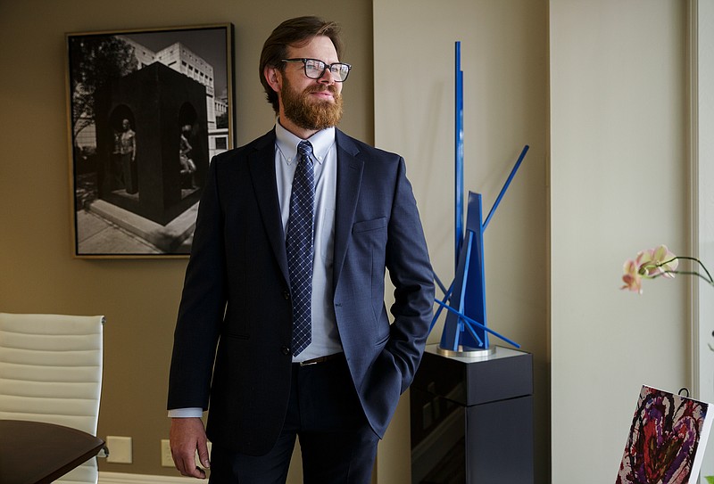 Former Envision intern Chris King, who will be hired at the Elliott Davis Decosimo accounting firm full time, poses for a portrait in the Elliott Davis Decosimo offices on Wednesday, April 25, 2018, in Chattanooga, Tenn. 