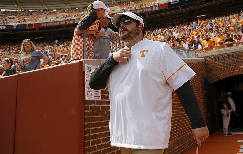 Tennessee tight ends coach Brian Niedermeyer takes the field for the second half of the Orange and White spring game at Neyland Stadium on Saturday, April 21, 2018 in Knoxville, Tenn.