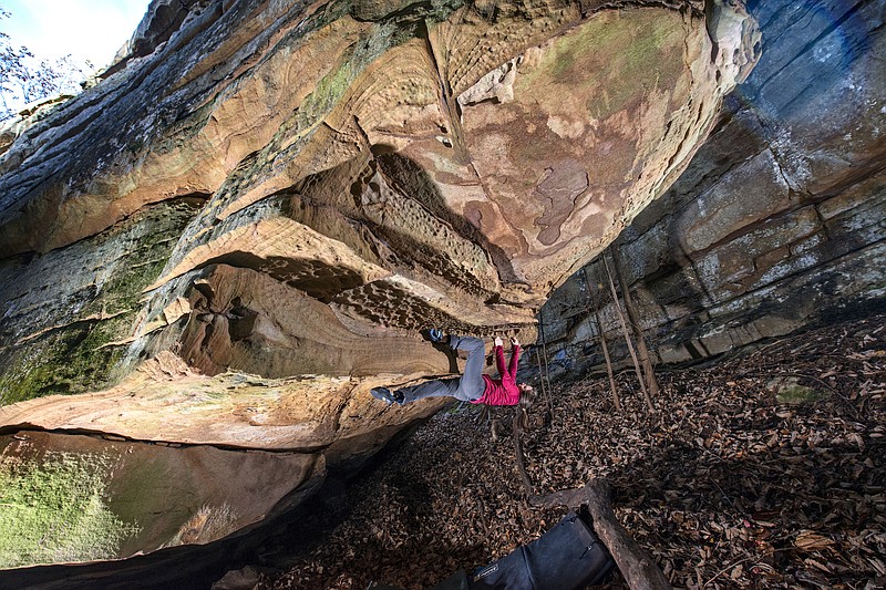 Ehrin Irvin climbs Hell's Kitchen boulders on Dec 11, 2017. Two climbing groups partnered to purchase the property, and one other, to open additional bouldering areas in the region. (Contributed photo by Shannon Millsaps)