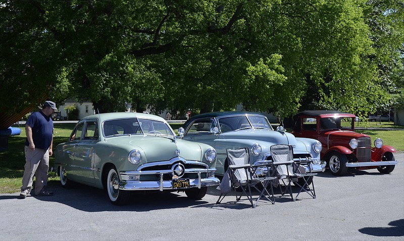 Jeff Payne checks out vintage cars during a previous Down Home Days in Chickamauga, Ga. A cruise-in will be part of the fun May 19.