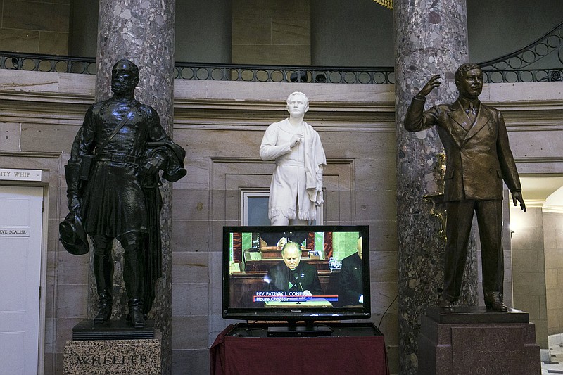 FILE — The Rev. Patrick Conroy, then the House chaplain, is pictured on a video monitor during the opening prayer as the 115th Congress convened at the Capitol. House Speaker Paul Ryan (R-Wis.) fired Conroy, apparently over a prayer. (Al Drago/The New York Times)