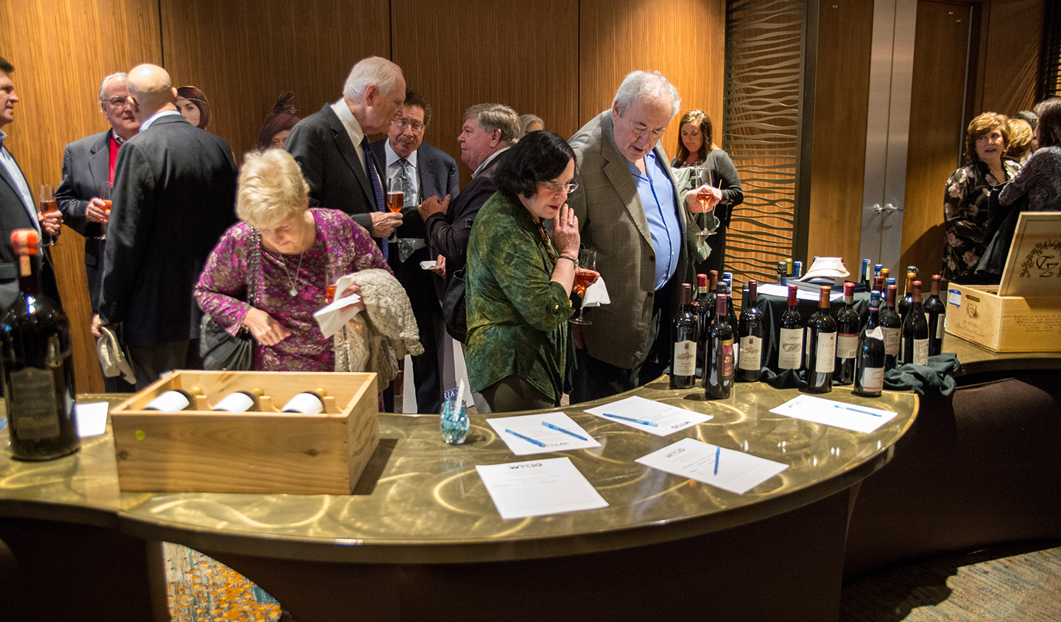 Attendees check out the auction items.