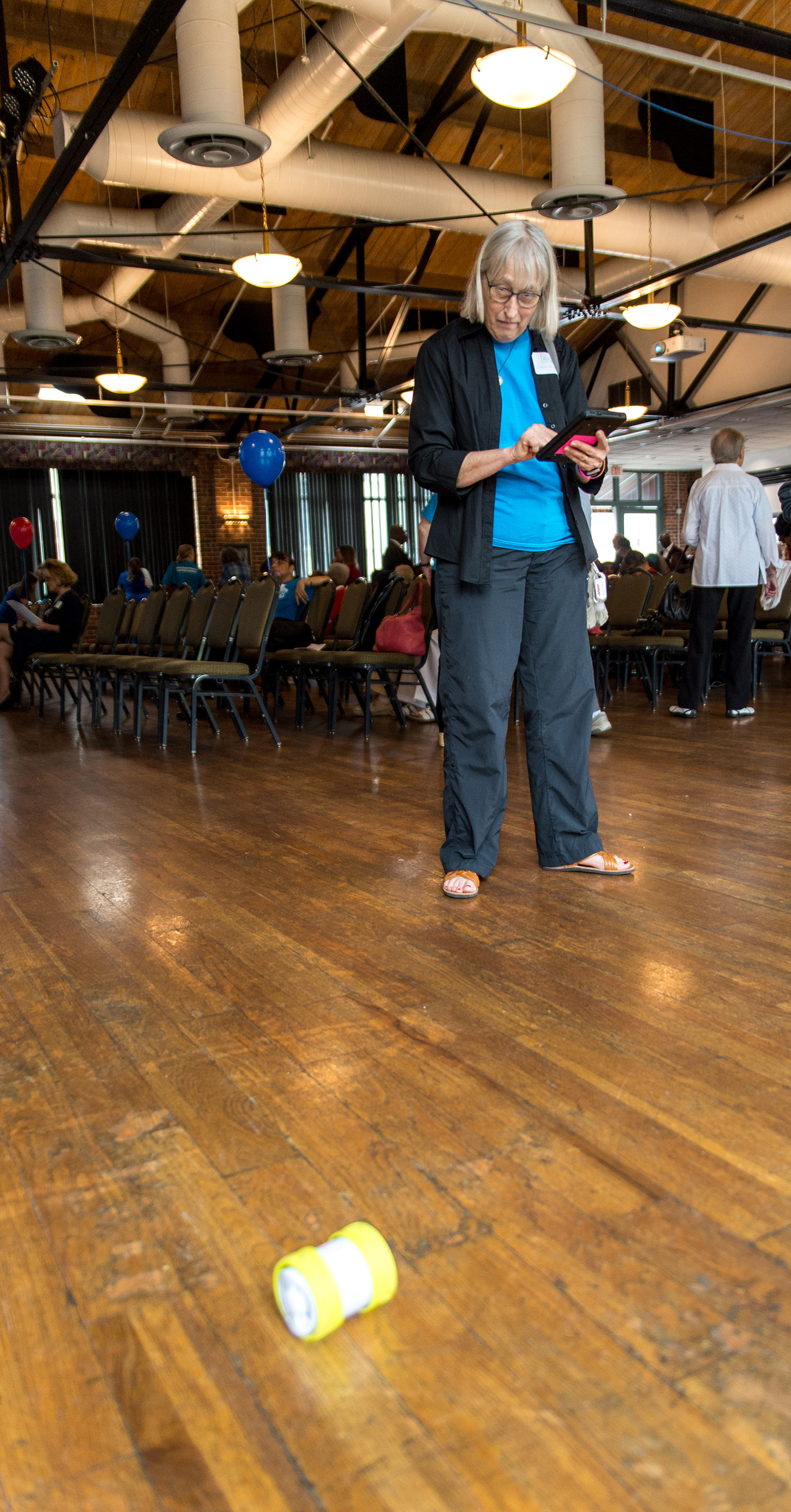 Sara Tucker tries out a coding robot.