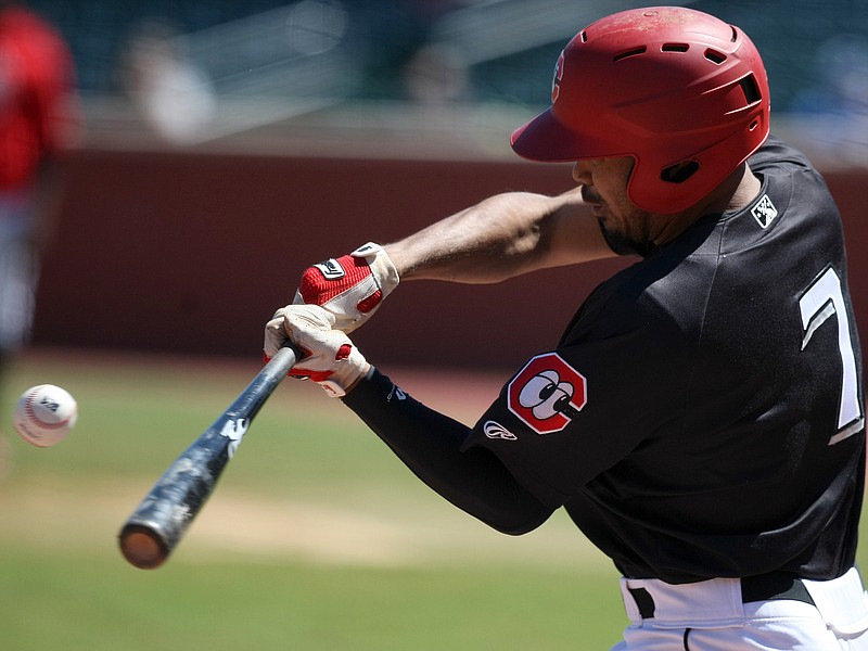 Chattanooga Lookouts left fielder LaMonte Wade (7) connects for a foul tip during the bottom of the first inning against the Jackson Generals at AT&T Field on Wednesday, June 7, in Chattanooga, Tenn.