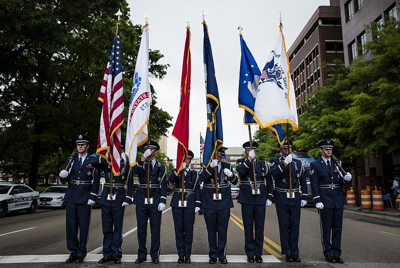 The 69th annual Armed Forces Day Parade will highlight the U.S. Coast Guard when the parade is held Friday, May 4. The parade steps off at 10:30 a.m. from the intersection of M.L. King Boulevard and Market Street, moving north on Market to Aquarium Way. About 100 floats, bands, JROTC, military and veterans groups will be in the lineup. Shown is the U.S. Air Force Color Guard, which led the 2017 Armed Forces Day Parade down Market Street. (Staff File Photo by Doug Strickland)