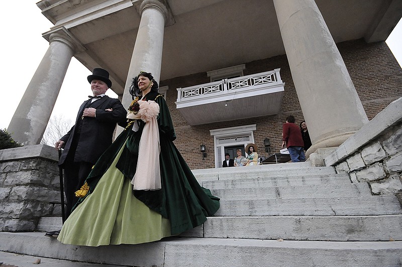 Rhett Butler and Scarlett O'Hara look alike contest winners Doug Carson and Tillie Denney are presented to onlookers. The contest was part of The Gone With The Wind Ball held at Gordon Lee Mansion.