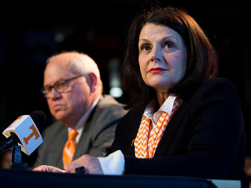 University of Tennessee Chancellor Beverly Davenport and Phillip Fulmer, left, hold a news conference on Friday, Dec. 1, 2017, after Fulmer was named acting athletic director. (Calvin Mattheis/News Sentinel)