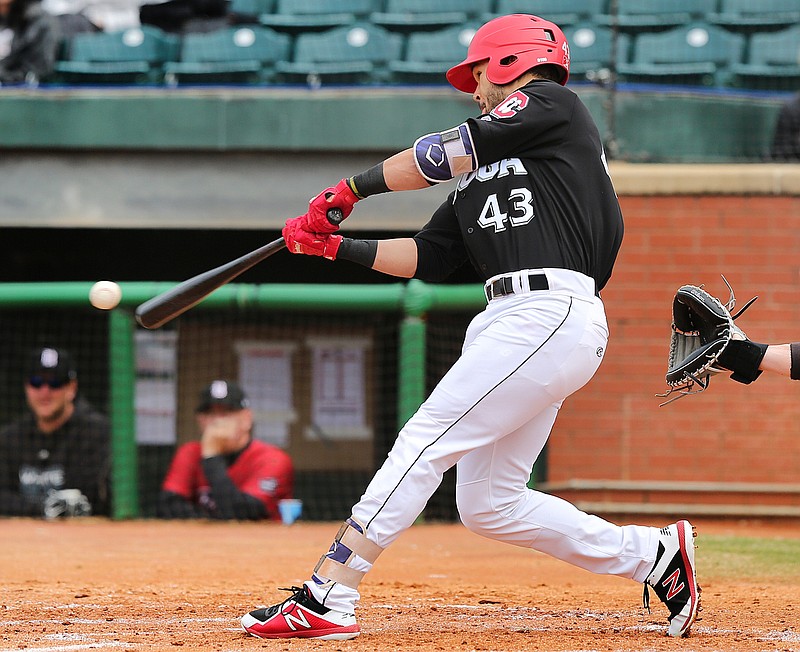 Zander Wiel of the Chattanooga Lookouts makes contact with a pitch during a game early last month at AT&T Field. Wiel was hitting .316 through his first 23 games with the Double-A club.