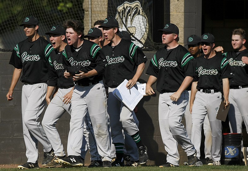 The East Hamilton dugout celebrates after Blaine Savage tied the game at 3-3 in the top of the second inning against Ooltewah during the District 5-AAA tournament at the Toby McKenzie Baseball Complex on the campus of Bradley Central High School on Wednesday, May 2, 2018 in Cleveland, Tenn.