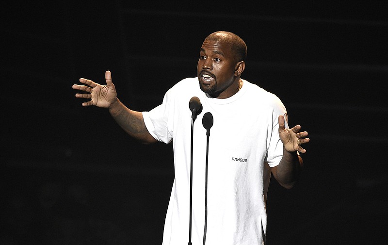 In this Aug. 28, 2016, file photo. Kanye West appears at the MTV Video Music Awards at Madison Square Garden in New York. West has called American slavery "a choice." In an interview Tuesday on "TMZ Live," West said, "When you hear about slavery for 400 years, for 400 years, that sounds like a choice." West also told TMZ that he became addicted to opioids that doctors prescribed after he had surgery for liposuction in 2016. He was hospitalized for a week and had to cut short a tour. (Photo by Chris Pizzello/Invision/AP, File)