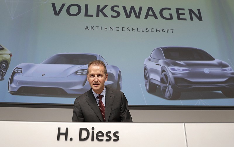 Herbert Diess, CEO of the Volkswagen stock company, poses for the media prior to the shareholders' meeting in Berlin, Germany, Thursday, May 3, 2018. (AP Photo/Michael Sohn)