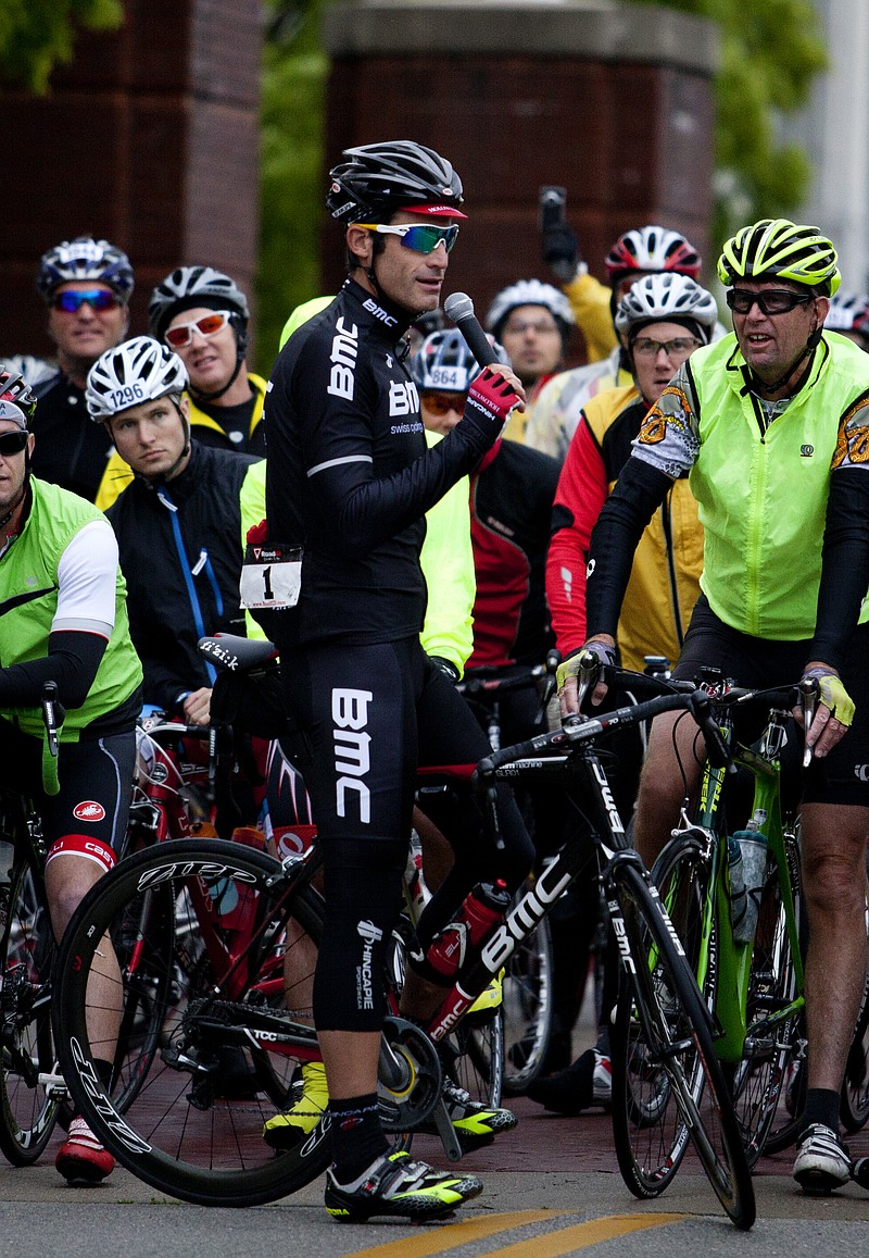 Former pro cyclist George Hincapie talks to the bikers before the start of the 3 State 3 Mountain Challenge in 2013.