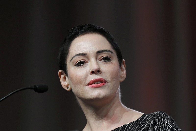 
              FILE- In this Oct. 27, 2017, file photo, actress Rose McGowan speaks at the inaugural Women's Convention in Detroit. A judge is scheduled to hear evidence on whether a drug possession charge in Virginia against McGowan should go forward. McGowan is seeking to have the charges against her dismissed. She has suggested the drugs may have been planted by agents hired by disgraced Hollywood producer Harvey Weinstein. (AP Photo/Paul Sancya, File)
            