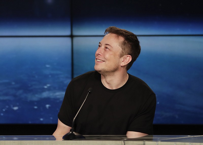 In this Feb. 6, 2018, file photo, Elon Musk, founder, CEO, and lead designer of SpaceX, speaks at a news conference after the Falcon 9 SpaceX heavy rocket launched successfully from the Kennedy Space Center in Cape Canaveral, Fla. Musk's quirky behavior has long been chalked up to that of a misunderstood genius. But never have his actions caused so much angst on Wall Street. Investors have for years endured millions of dollars in short-term losses in hopes of a long-term payoff. They might have even been able to stomach the $8.3 million that Telsa Inc. burns through each day. But it was a conference call Wednesday, May 2, that left many wondering how much more they can take. (AP Photo/John Raoux, File)