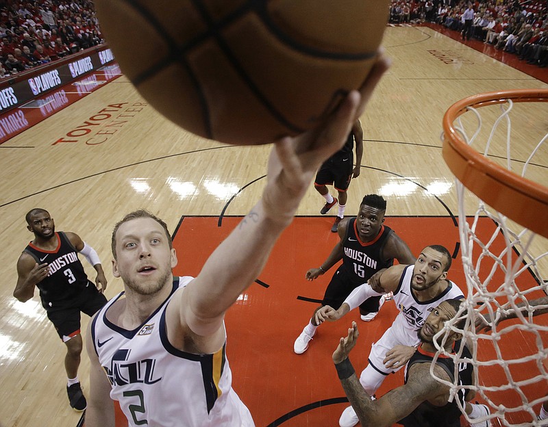 Utah Jazz forward Joe Ingles (2) drives to the basket during the first half in Game 2 of an NBA basketball second-round playoff series against the Houston Rockets, Wednesday, May 2, 2018, in Houston. (AP Photo/Eric Christian Smith)