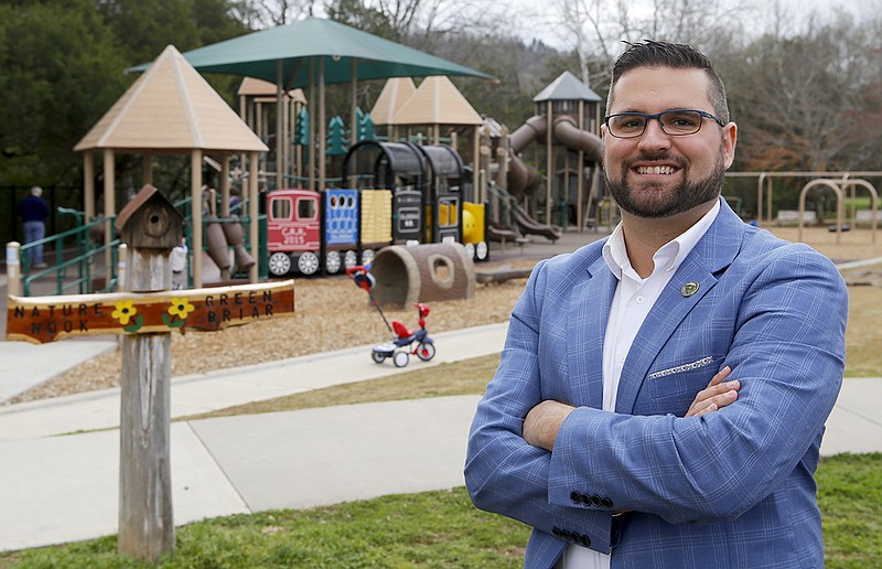 City Commissioner Ethan White poses in front of the Imagination Station playground on Friday, March 30, 2018, in Collegedale, Tenn.