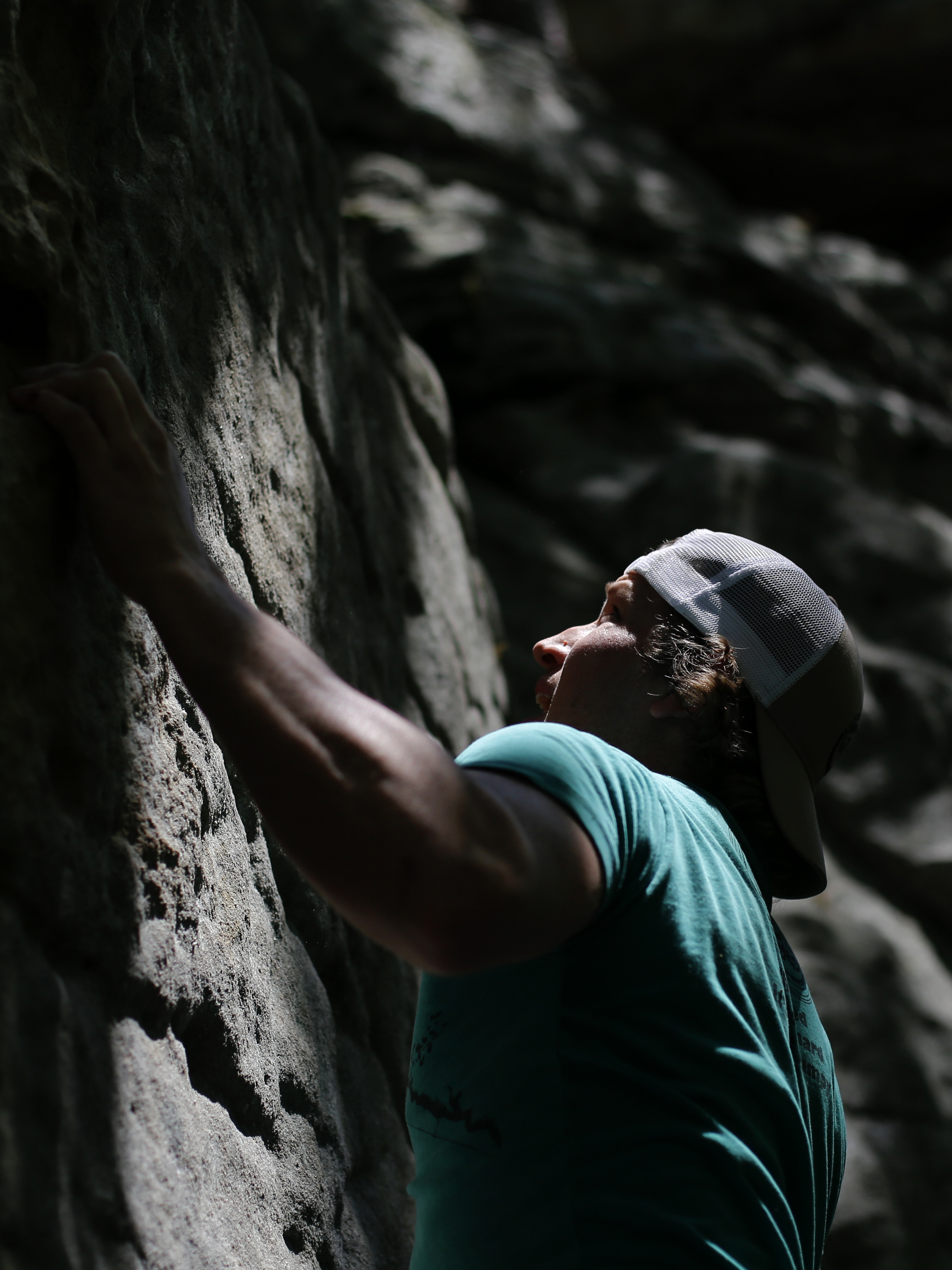 Donnie Goepper climbs a boulder at Stone Fort, also known as Little Rock City, on Sunday, May 6, 2018 in Soddy-Daisy, Tenn. To coincide with the opening of their new Chattanooga store on May 18, REI sponsored a weekend of outdoor activities including free entrance to Stone Fort/Little Rock City.