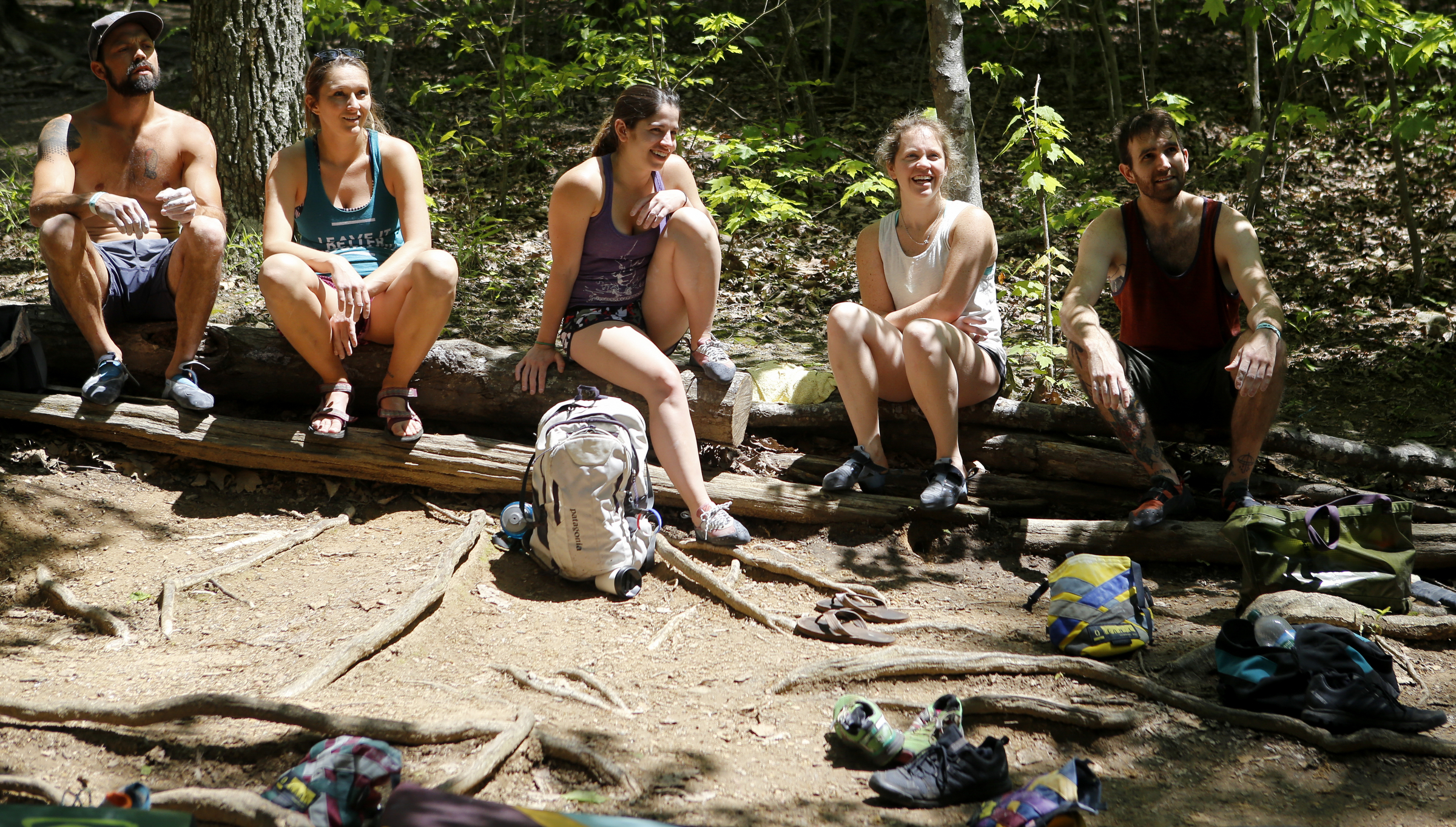 Casey Smith, left, Shannon Tattitch, Andi Abode, Vicky Sinnott and Will Wood look on as a friend climbs at Stone Fort, also known as Little Rock City, on Sunday, May 6, 2018 in Soddy-Daisy, Tenn. To coincide with the opening of their new Chattanooga store on May 18, REI sponsored a weekend of outdoor activities including free entrance to Stone Fort/Little Rock City.
