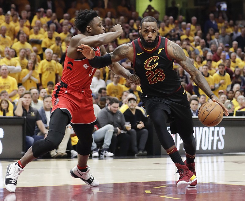 Cleveland Cavaliers' LeBron James (23) drives on Toronto Raptors' OG Anunoby (3), from England, in the first half of Game 4 of an NBA basketball second-round playoff series, Monday, May 7, 2018, in Cleveland. (AP Photo/Tony Dejak)