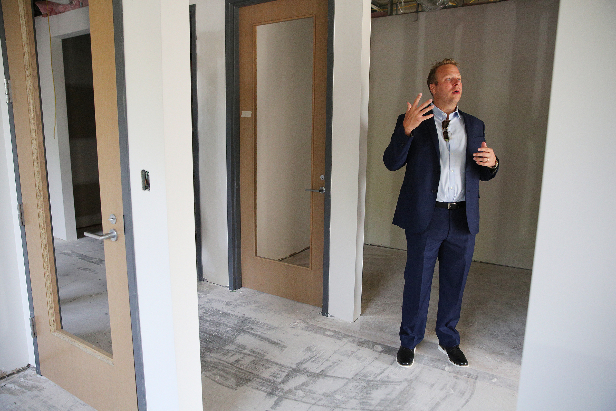 Jon Pirtle, chief executive officer of E/SPACES, shows off some of the mid-sized office spaces in E/SPACES Wednesday, May 2, 2018 in Chattanooga, Tenn. E/SPACES offers a variety of offices as well as meeting rooms and larger common spaces.