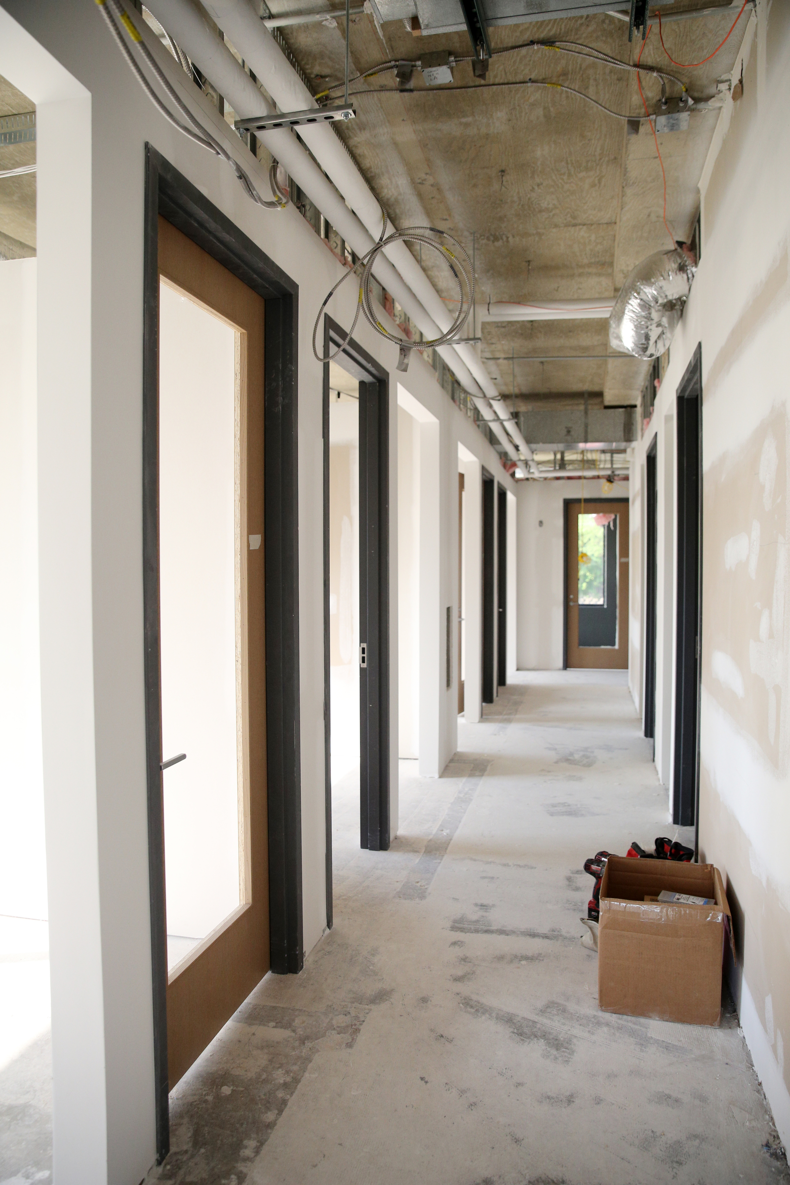 Offices line the hallways in E/SPACES Wednesday, May 2, 2018 in Chattanooga, Tenn. E/SPACES is 7,800 square feet of office spaces in a variety of shapes and sizes for professionals to rent out.