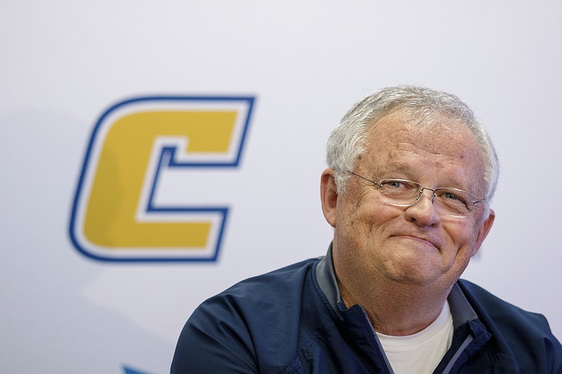 Jim Foster speaks during a May 2018 news conference announcing his retirement as women's basketball coach at UTC.