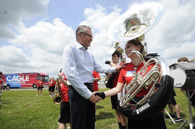 Georgia Lieut. Gov. Casey Cagle thanks LFO Warrior band member Jessica Trewhitt for her part in Friday's campaign rally in Fort Oglethorpe.