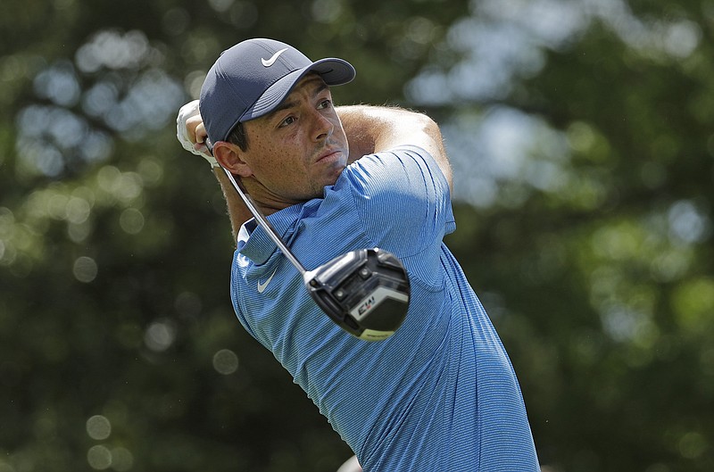 Rory McIlroy, of Northern Ireland, watches his tee shot on the third hole during the final round of the Wells Fargo Championship golf tournament at Quail Hollow Club in Charlotte, N.C., Sunday, May 6, 2018.
