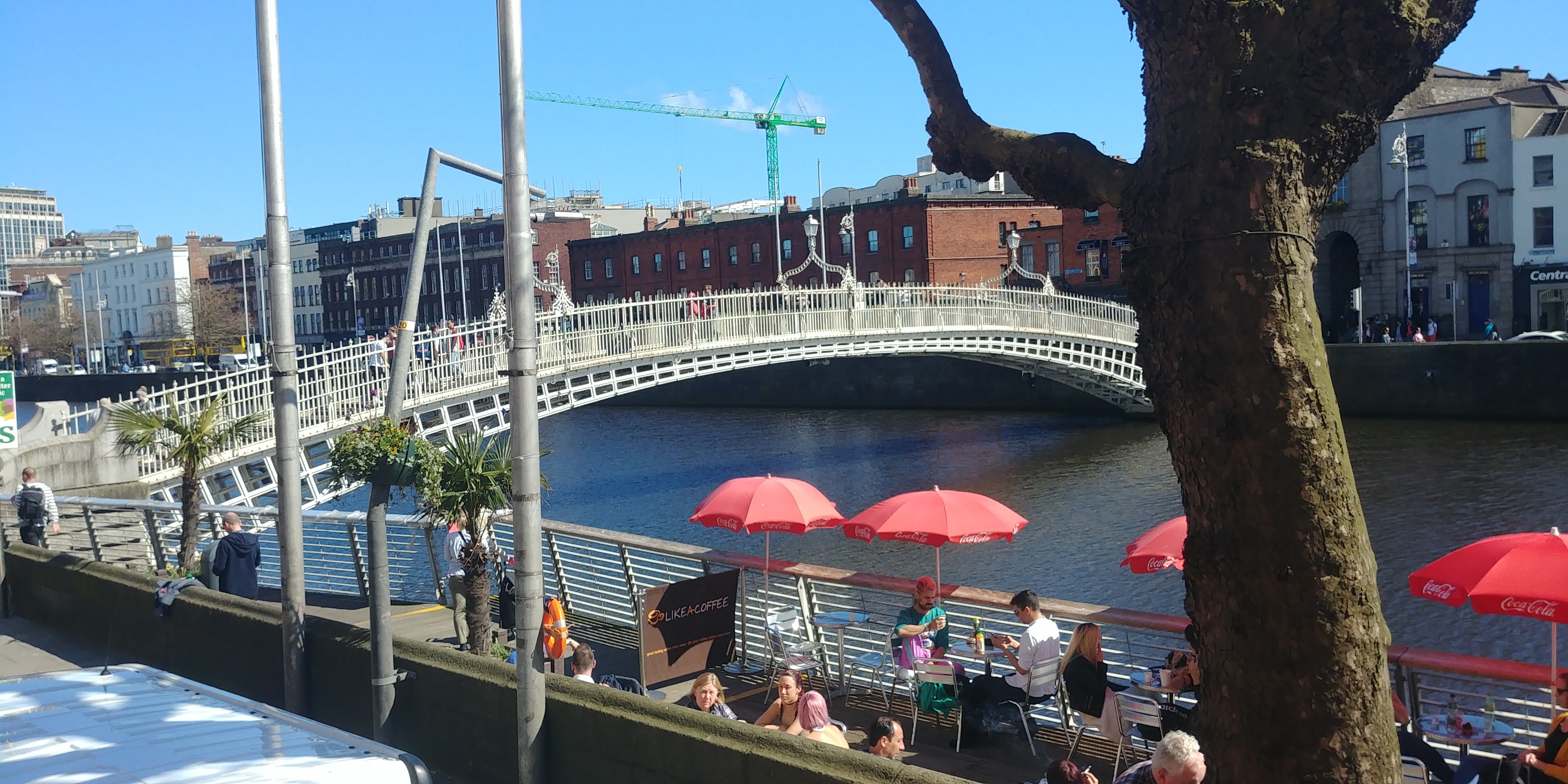 The Ha'Penny Bridge spans the River Liffey between Bachelors Walk and Temple Bar. It once cost folks a half penny to cross. Now it's free.