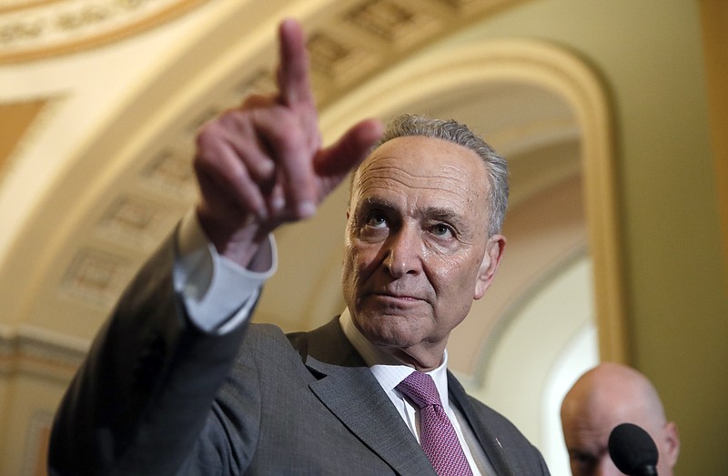 Senate Minority Leader Chuck Schumer of N.Y., points to a question during a media availability after a policy luncheon on Capitol Hill, Tuesday, May 8, 2018 in Washington. (AP Photo/Alex Brandon)

