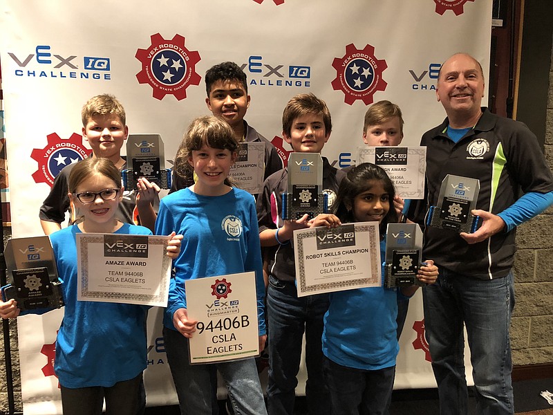 The Chattanooga School for the Liberal Arts VEX Robotics teams gather at the state championship. Back from left are Justin Syler, Jerald Arden Freeman, Rohan Woodruff, Edward Ziedins and coach Scott Rosenow; front from left are Ella Brandon, Anna Clark and Nishi Bonthula. (Contributed photo)