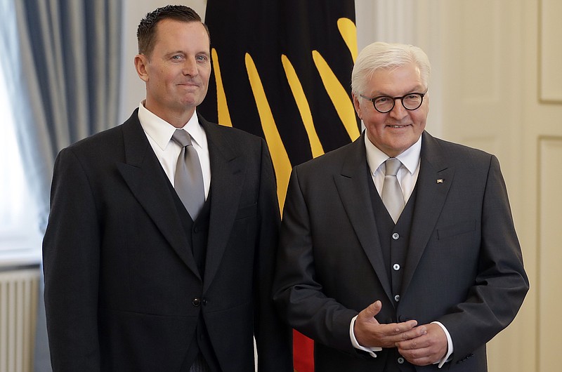 German President Frank-Walter Steinmeier, right, and U.S. ambassador in Germany, Richard Allen Grenell, left, pose for the media during Grenell's accreditation at the Bellevue palace in Berlin, Germany, on May 8, 2018. (AP Photo/Michael Sohn)