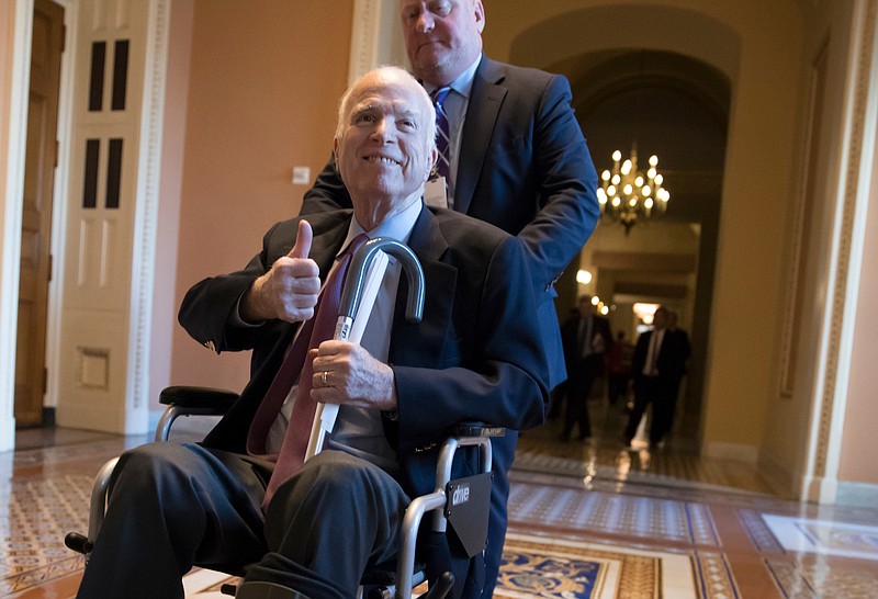 In this Dec. 1, 2017, file photo, Sen. John McCain, R-Ariz., who has a terminal cancer diagnosis, leaves a closed-door session on Capitol Hill in Washington. (AP Photo/J. Scott Applewhite, File)