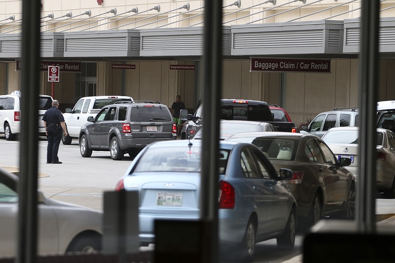 Vehicles fill the front of Chattanooga Metropolitan Airport, which is gaining new service to Washington Dulles but losing nonstops to Newark, N.J.