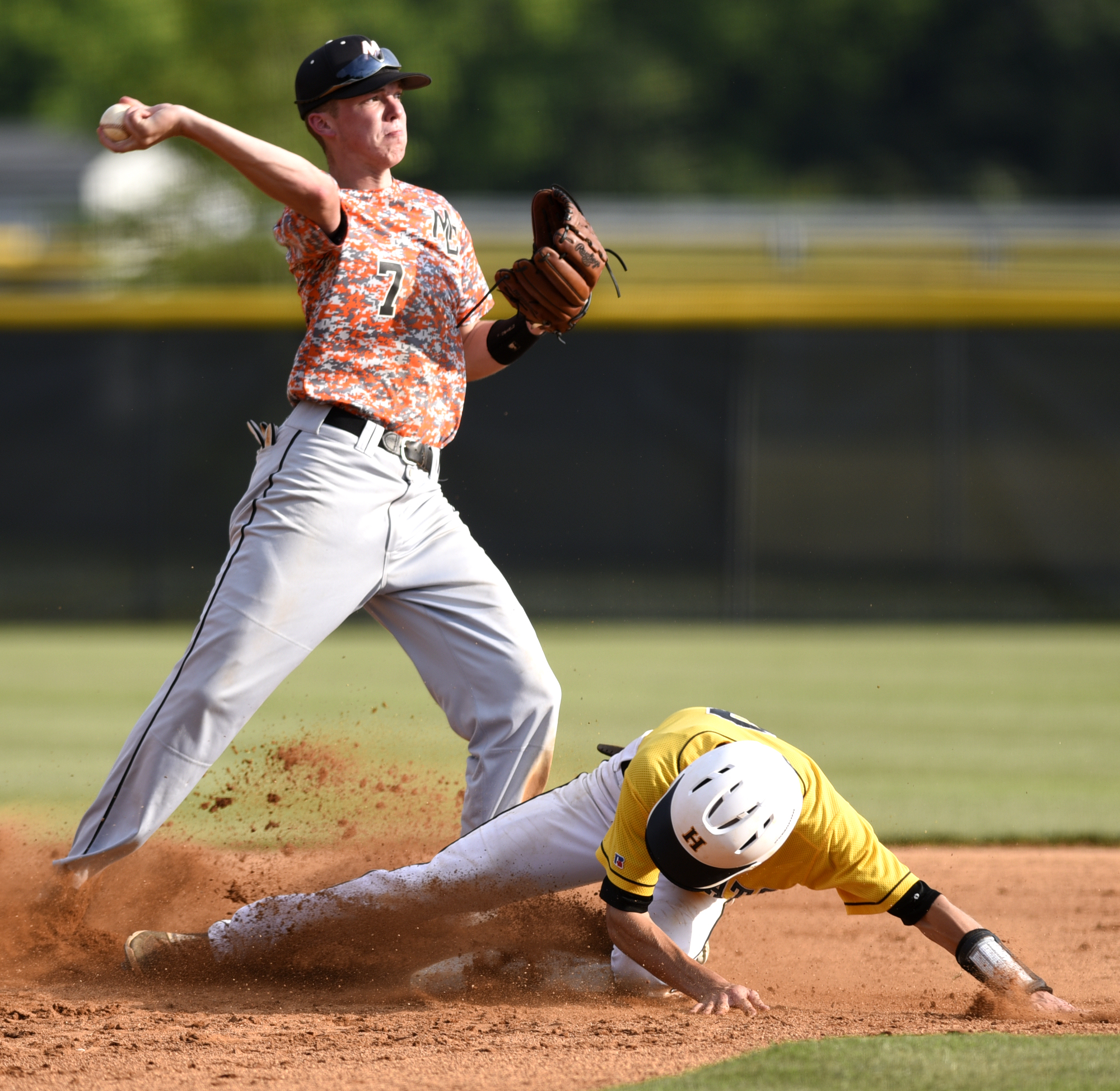 Meigs second baseman, Aaron Johnson (7) forces Hixson's Alex Rollins (2) at second in a attempt for a double play. The Hixson runner was safe at first. The Meigs County Tigers visited the Hixson Wildcats in the TSSAA Region 3-AA baseball final on May 14, 2018.
