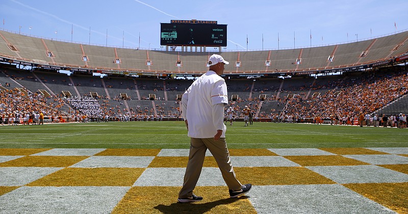 Tennessee head coach Jeremy Pruitt walks on the field before the Orange and White spring game at Neyland Stadium on Saturday, April 21, 2018, in Knoxville, Tenn.