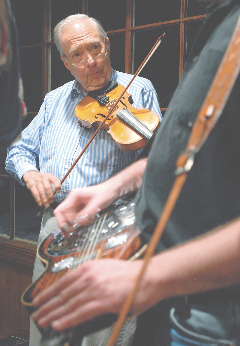 Fletcher Bright plays fiddle with the Dismembered Tennesseans. (File Staff Photo)