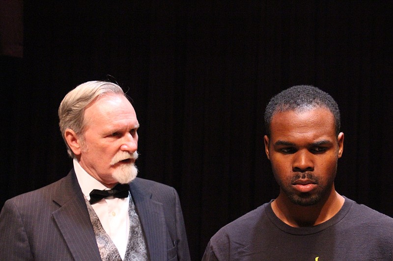 Sheriff Joseph Shipp, played by Bruce Shaw, interrogates Ed Johnson, played byDamon Buxton, in a rehearsal of "Dead Innocent."