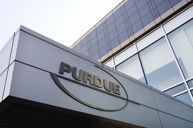 FILE - This Tuesday, May 8, 2007 file photo shows the Purdue Pharma offices in Stamford, Conn. Nevada and five other states are filing new lawsuits alleging that a pharmaceutical company used deceptive marketing to boost drugs sales that fueled opioid overdose deaths. Nevada state Attorney General Adam Paul Laxalt alleges in a civil complaint filed Tuesday, May 15, 2018, that Purdue Pharma minimized risks and overstated benefits of long-term use of narcotic opioids including OxyContin. (AP Photo/Douglas Healey, File)