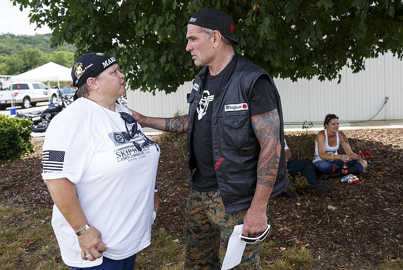 Staff photo by Doug Strickland / Cathy Wells, mother of Skip Wells, talks with Jason Weeks at Thunder Creek Harley Davidson after a motorcycle ride from Atlanta to Chattanooga to honor the memory of her son on Saturday, July 9, 2016, in Chattanooga, Tenn.