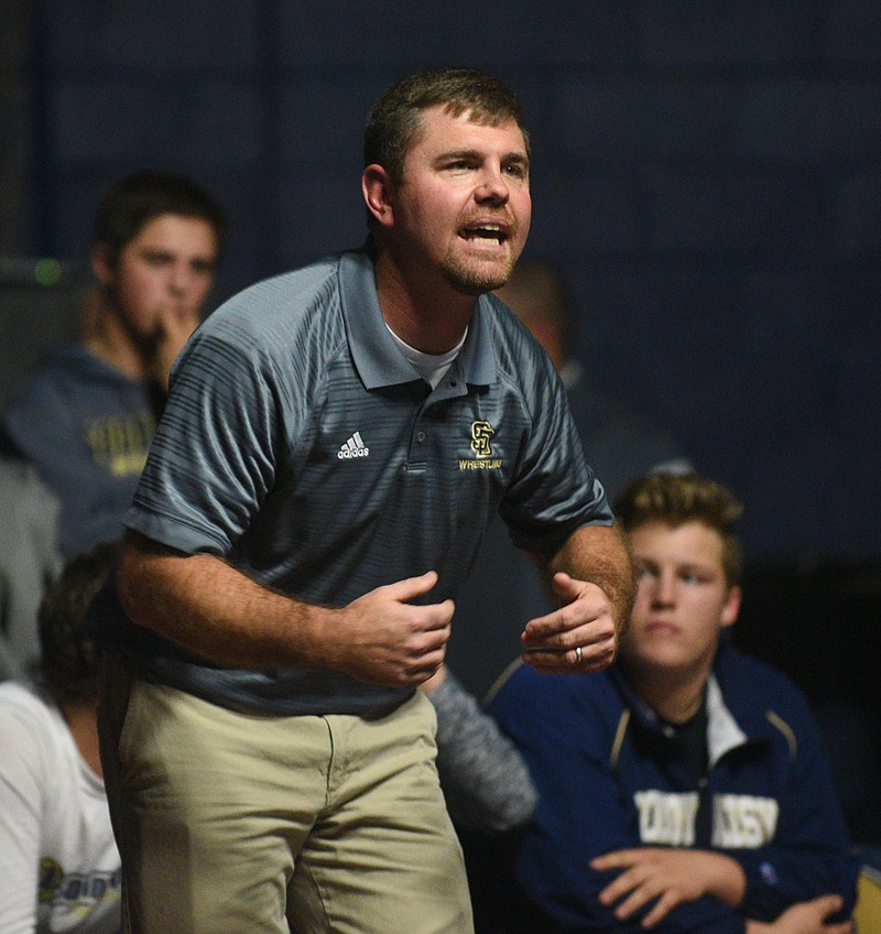 Soddy-Daisy coach Jim Higgins watches a match against Cleveland Thursday, January 5, 2017 in the Soddy-Daisy wrestling arena.