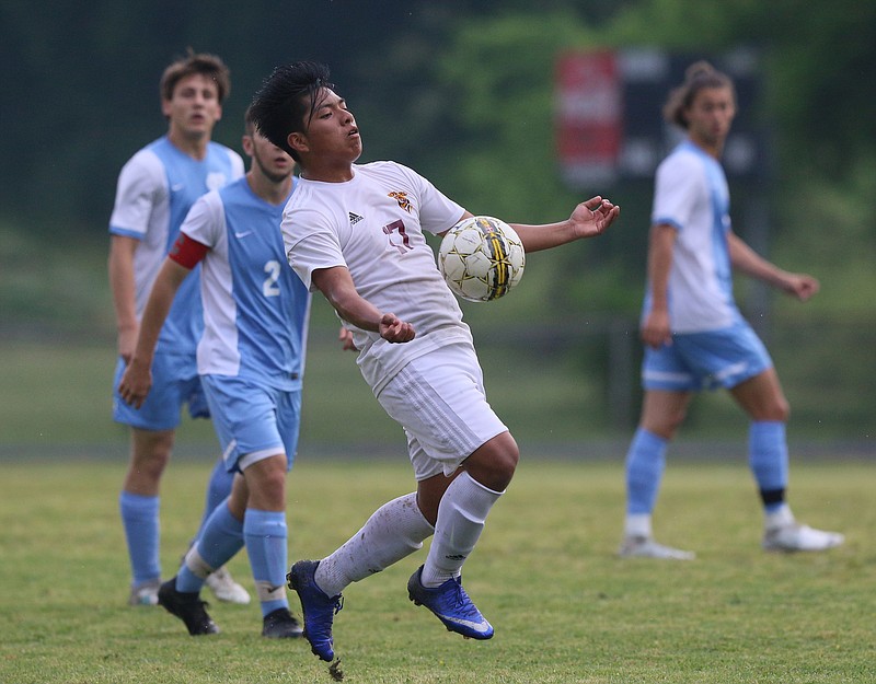 Howard's Mark Perez (17) settles the ball during the McMinn Central vs. Howard boys' soccer Region 4-AA semifinals game Tuesday, May 15, 2018 at Howard High School in Chattanooga, Tenn.