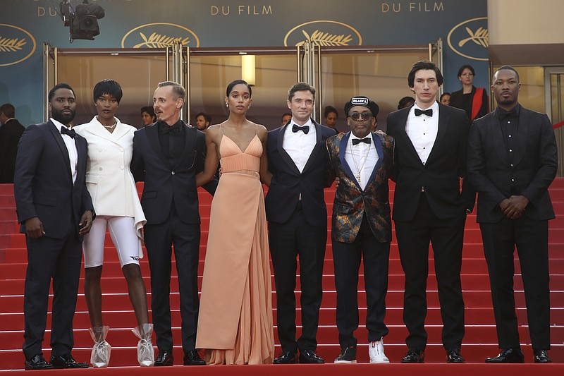 Actors John David Washington, from left, Damaris Lewis, Jasper Paakkonen, Laura Harrier, Topher Grace, director Spike Lee, actors Adam Driver, and Corey Hawkins pose for photographers upon arrival at the premiere of the film 'BlacKkKlansman' at the 71st international film festival, Cannes, southern France, Monday, May 14, 2018. (Photo by Joel C Ryan/Invision/AP)

