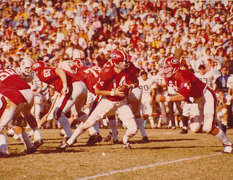Former Georgia quarterback Andy Johnson, who led the Bulldogs to an 11-1 record as a sophomore in 1971, died Wednesday at the age of 65.