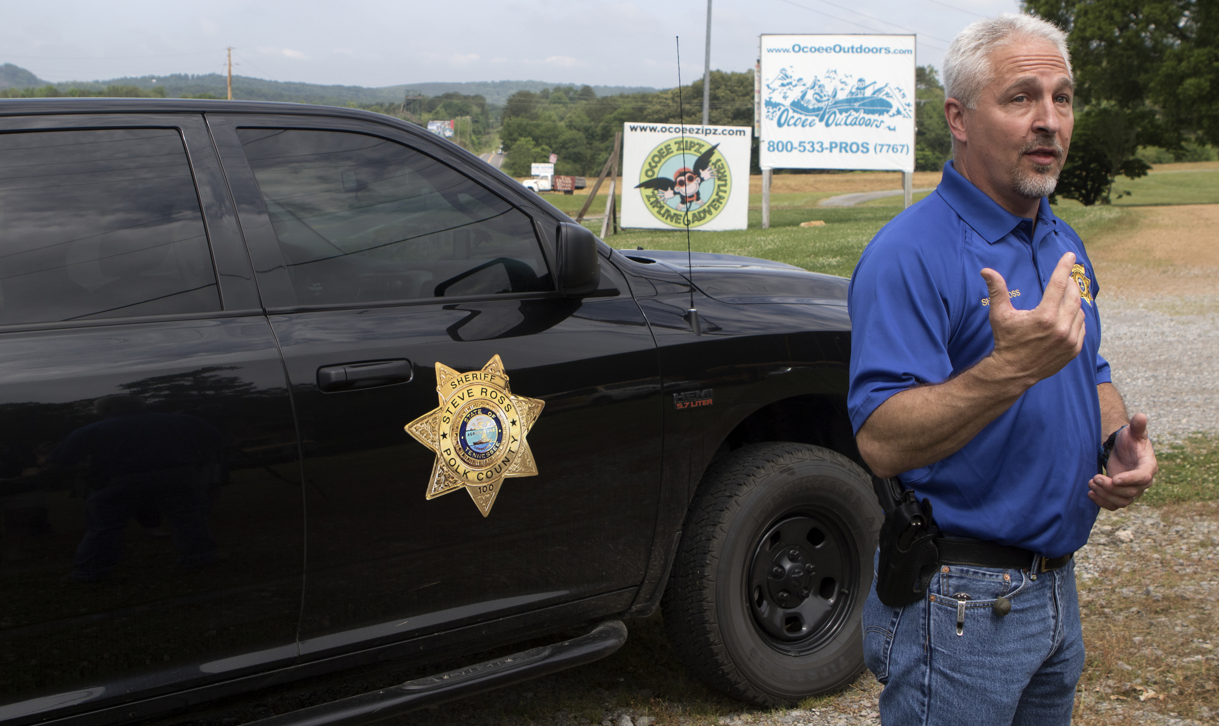 Polk County Sheriff Steve Ross speaks to the media about the tanker truck that overturned into the Ocoee River yesterday evening in Polk County near the Tennessee Valley Authority Ocoee #1 dam on Wednesday, May 16, 2018, in Benton, Tenn.