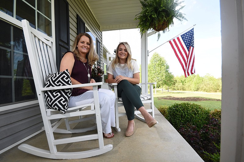 Kim Slaughter,left, program mentor for WGU University, and her daughter, Chloe Smallwood, who is a grad student at WGU, work from home in Dunlap.